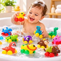 Newborn bath accessories featuring portable tub, hooded towels, water toys and temperature checker