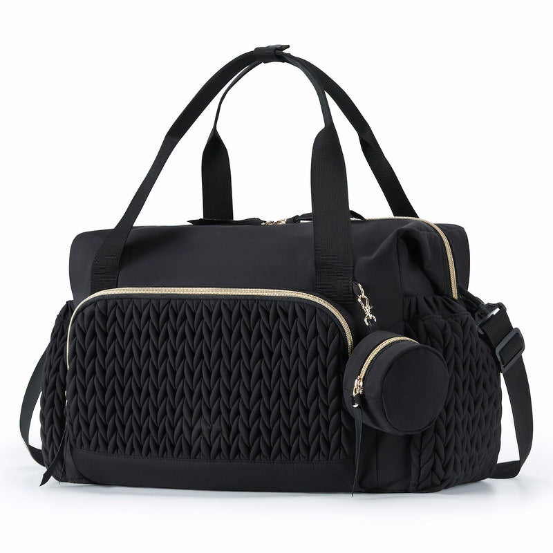 Spacious newborn essentials bag for diapers, feeding supplies and baby clothing