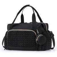 Spacious newborn essentials bag for diapers, feeding supplies and baby clothing