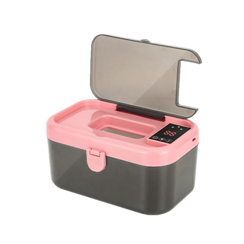 Soft night light illuminating the wipe warmer during nighttime use.