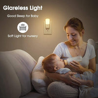 LED night light providing soft warm glow in bedroom at night