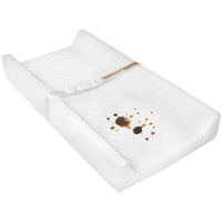 Underside view of a baby changing pad showing the non-slip grip material