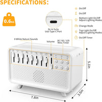 White noise machine with its integrated night light illuminated in a bedroom setting.