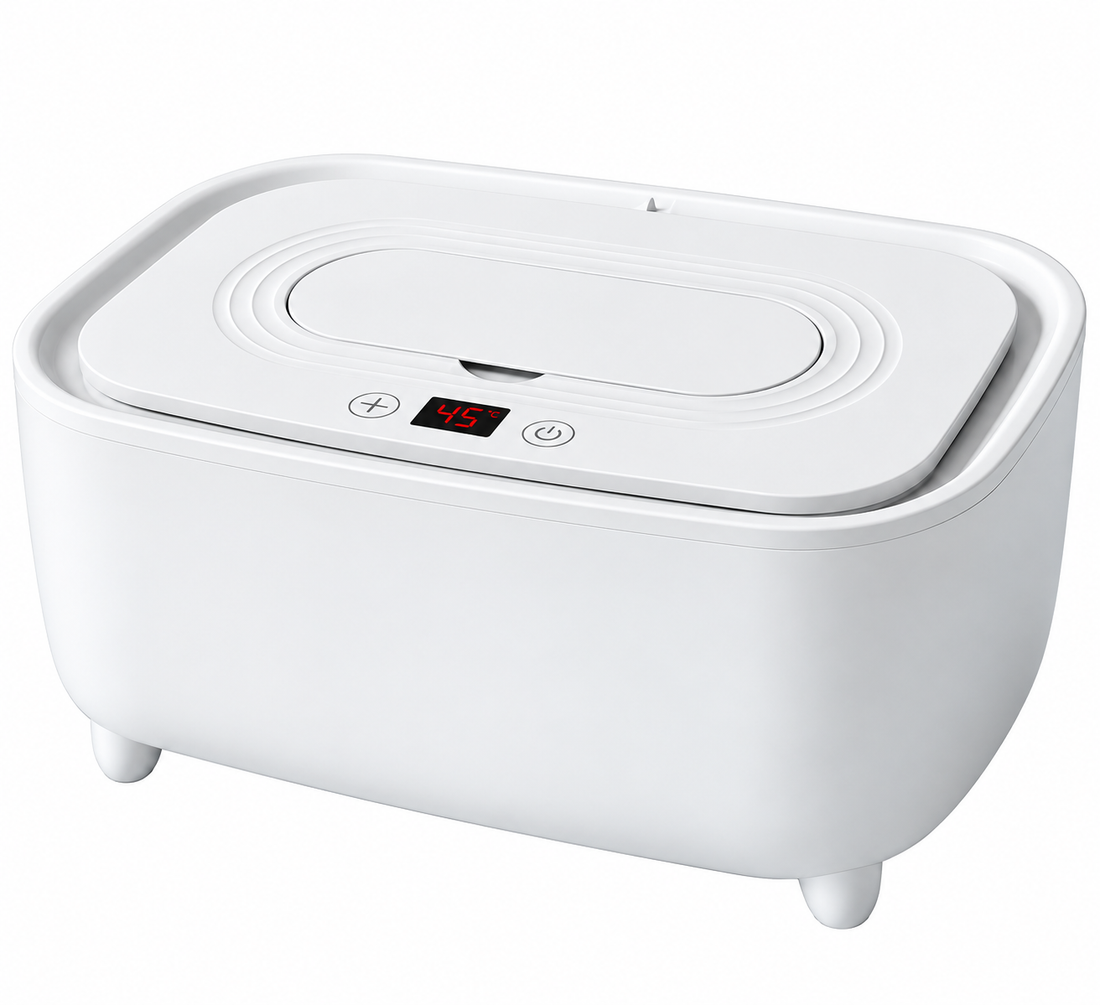 Baby tissue warming unit positioned on a clean nursery changing table.