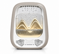Nursery sound machine featuring decorative flowing water design for bedtime use