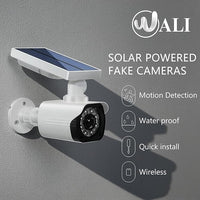 dummy security camera installed outside house wall protection