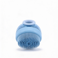Silicone pet bath brushes shown as a two-piece set