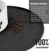 Front view of a black pet bowl mat