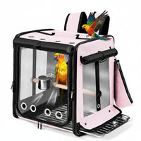 Pink bird carrier backpack with simple carrier design for small birds.