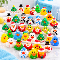 Close-up of Santa, snowman and penguin duck designs with decorative holiday details