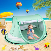 Portable baby beach tent with water-resistant floor and easy setup