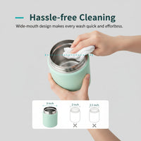 Close-up of portable bottle warmer digital controls and display