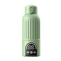 Sage-green portable bottle warmer with ribbed body, digital display and top closure