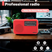 Portable handheld AM FM radio with headphone jack and compact lightweight design
