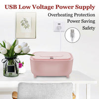 Compact wet tissue heating container designed for nursery changing areas.