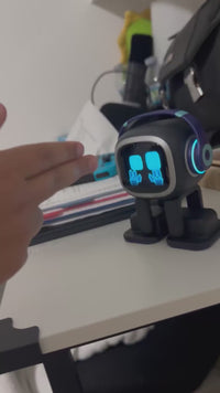 Expressive desktop robot with interactive movement and smart features