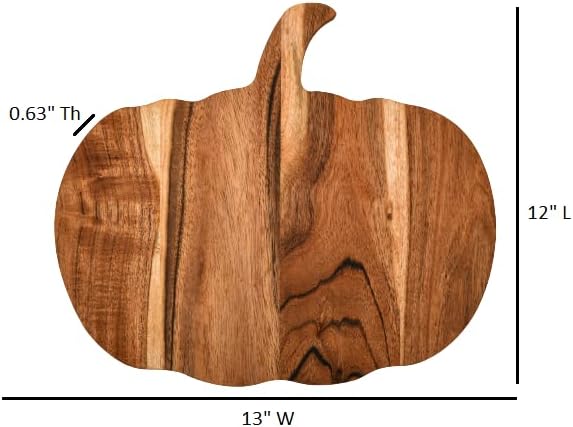 Pumpkin wooden charcuterie board arranged with snacks