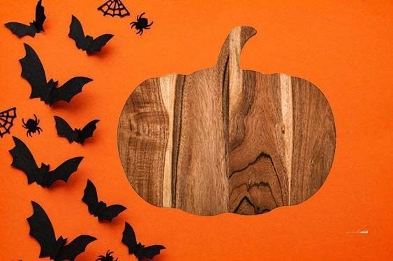 Pumpkin shaped wood serving board with natural finish