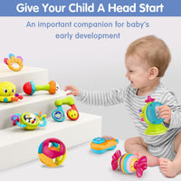 Candy-inspired infant toy with a striped rainbow centre and pink bow-shaped ends.