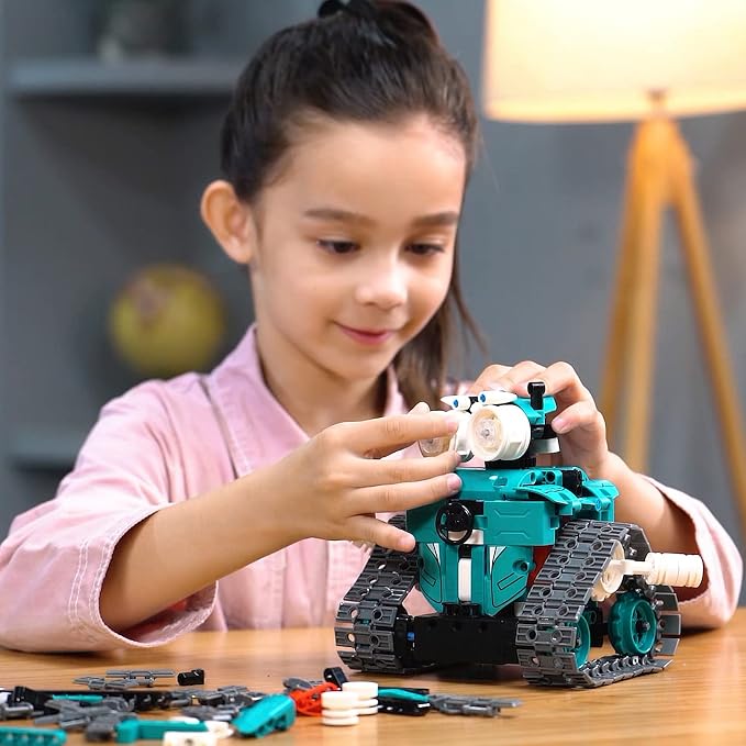 3-in-1 RC robot car building kit displayed with its construction components.
