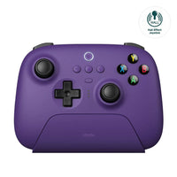 Rechargeable wireless gaming controller on desk with charging dock