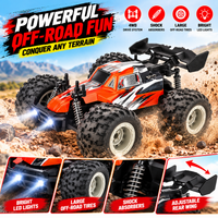 Remote control truck for kids with a sporty racing-style body and oversized wheels.