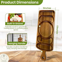Reversible wooden platter arranged with appetizers and vegetables