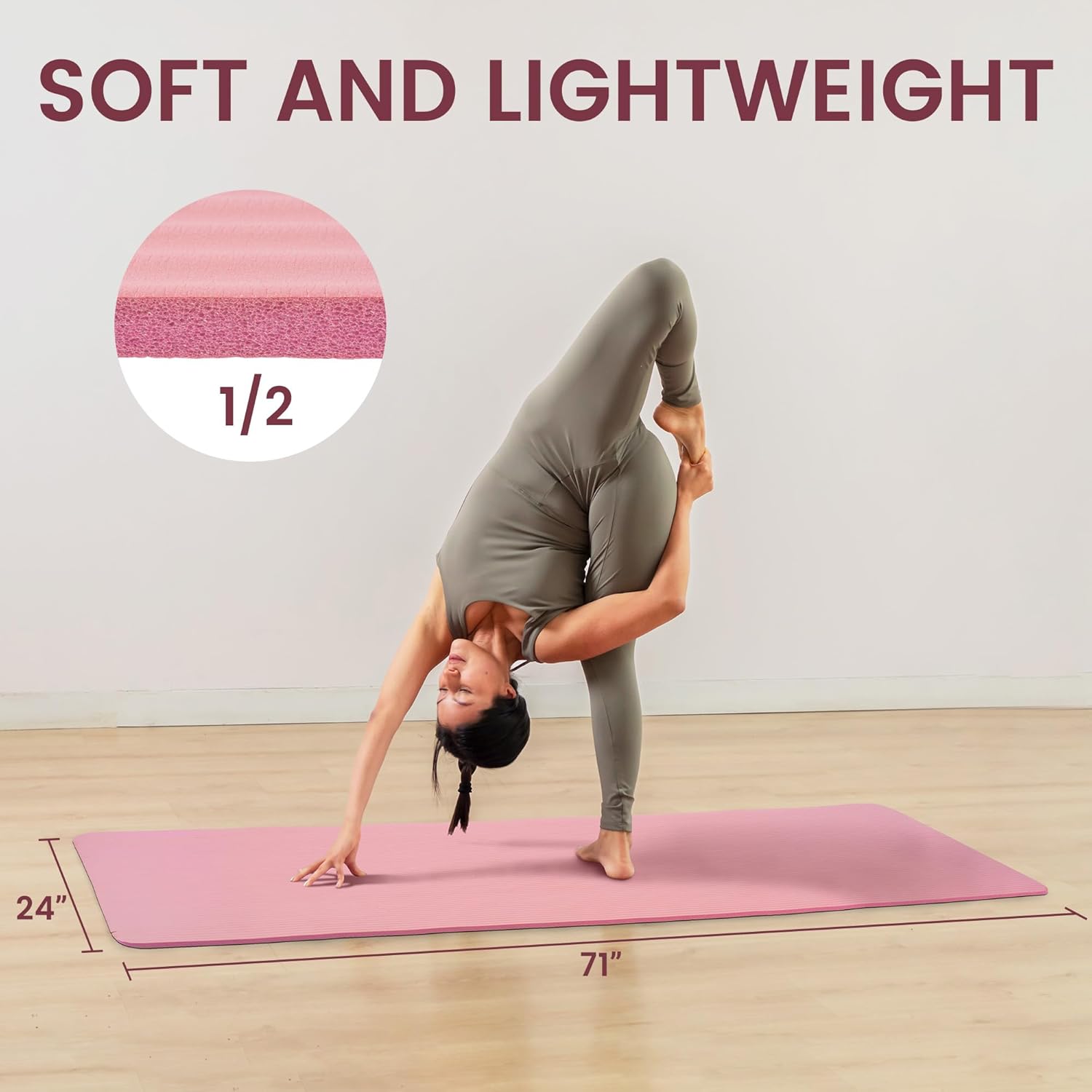 Rolled yoga mat secured with a carrying strap