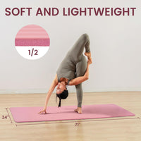 Rolled yoga mat secured with a carrying strap