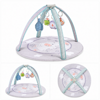 Round baby activity play mat with crossed arches and hanging toys