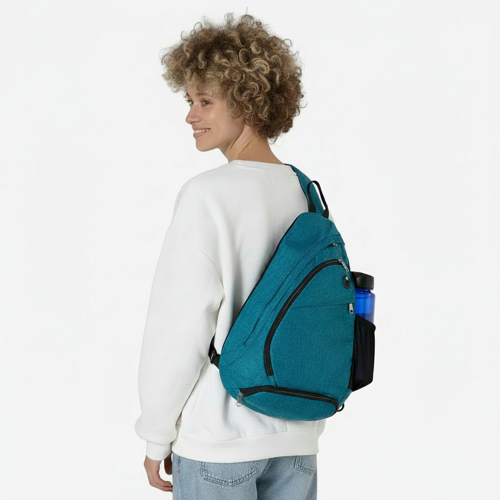 Sling backpack with dedicated water bottle and umbrella pocket