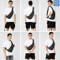 Black sling bag flat lay image with compartments and strap visible