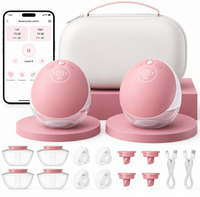 Smart wearable electric breast pump set with two pink hands-free pumping units