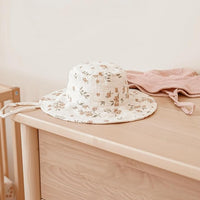 Soft muslin baby sun hat with adjustable chin strap