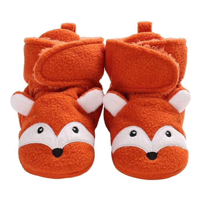  Front view of rounded textile shoes with a cosy plush finish.