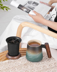 Blue tea cup with lid and removable infuser