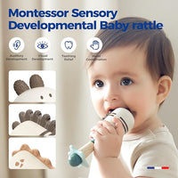 Close view of textured silicone sections on a dinosaur baby teether