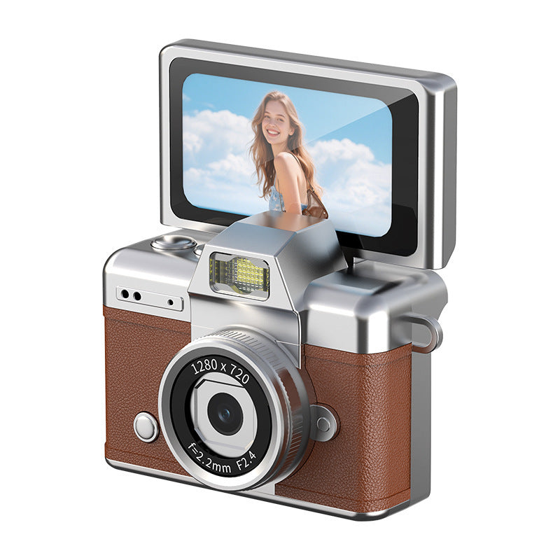 Traveler holding a pocket-sized camera while photographing an outdoor destination