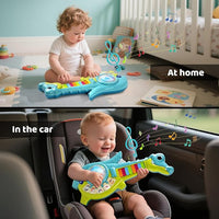 Toddler playing musical piano guitar toy educational learning toy for kids