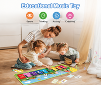 Toddler playing musical piano mat toy dance floor keyboard playmat for kids learning and fun