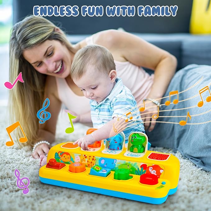 Toddler playing pop up animal toy educational toy for early learning