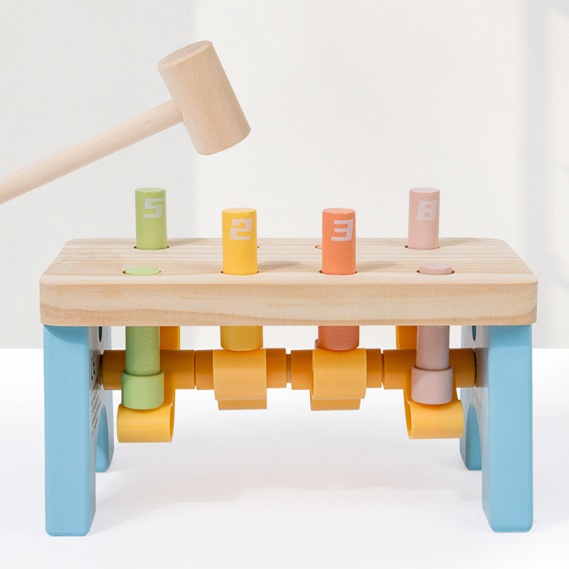 toddler-playing-pounding-bench-toy