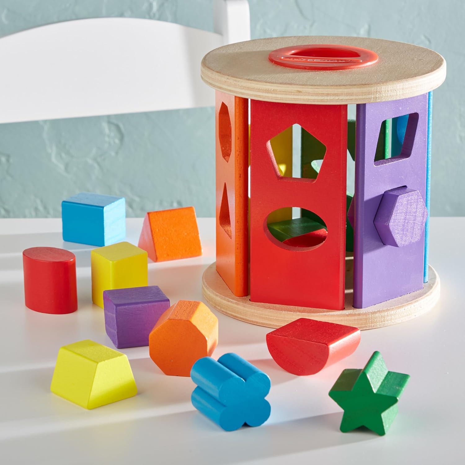 Toddler playing shape sorter toy educational learning toy for kids