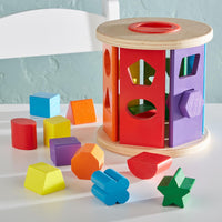 Toddler playing shape sorter toy educational learning toy for kids