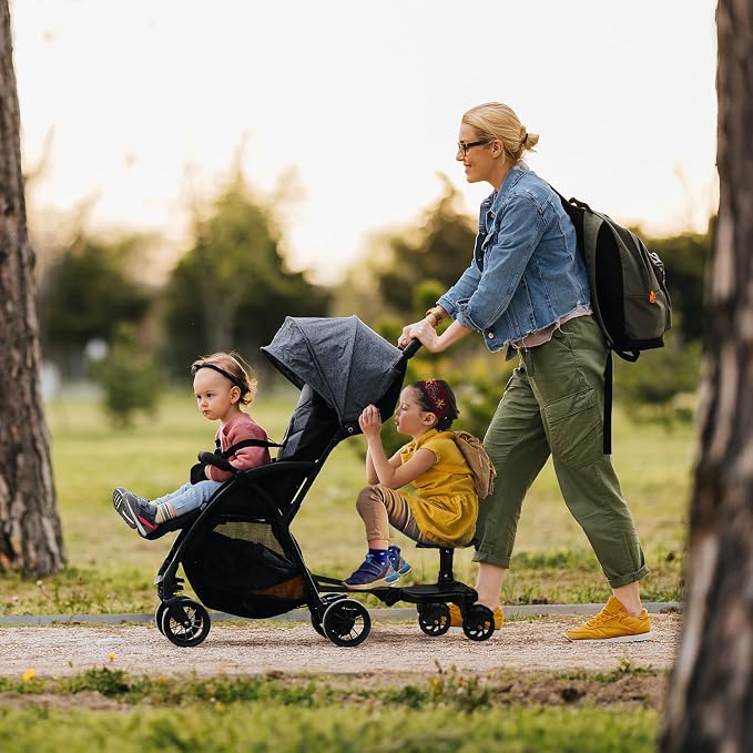 Toddler ride on stroller platform designed for standing behind a compatible stroller