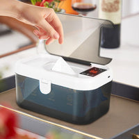 Top-heating system inside a baby wet wipe storage container.