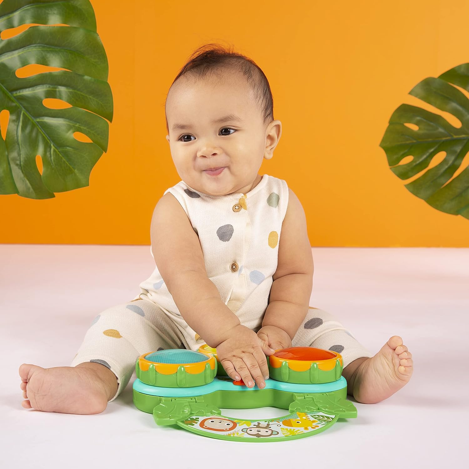 Musical drum toy for supervised baby tummy-time activities