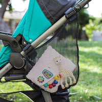 Close up of the adjustable non-slip hook-and-loop straps on a stroller net