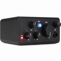 USB audio interface used in home recording setup with laptop