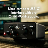 Microphone connected to USB audio interface for vocal recording